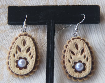 Birch bark earrings .