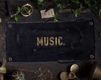 MUSIC. Brass letters on UPCYCLING JEANS in the used - industrial - vintage look