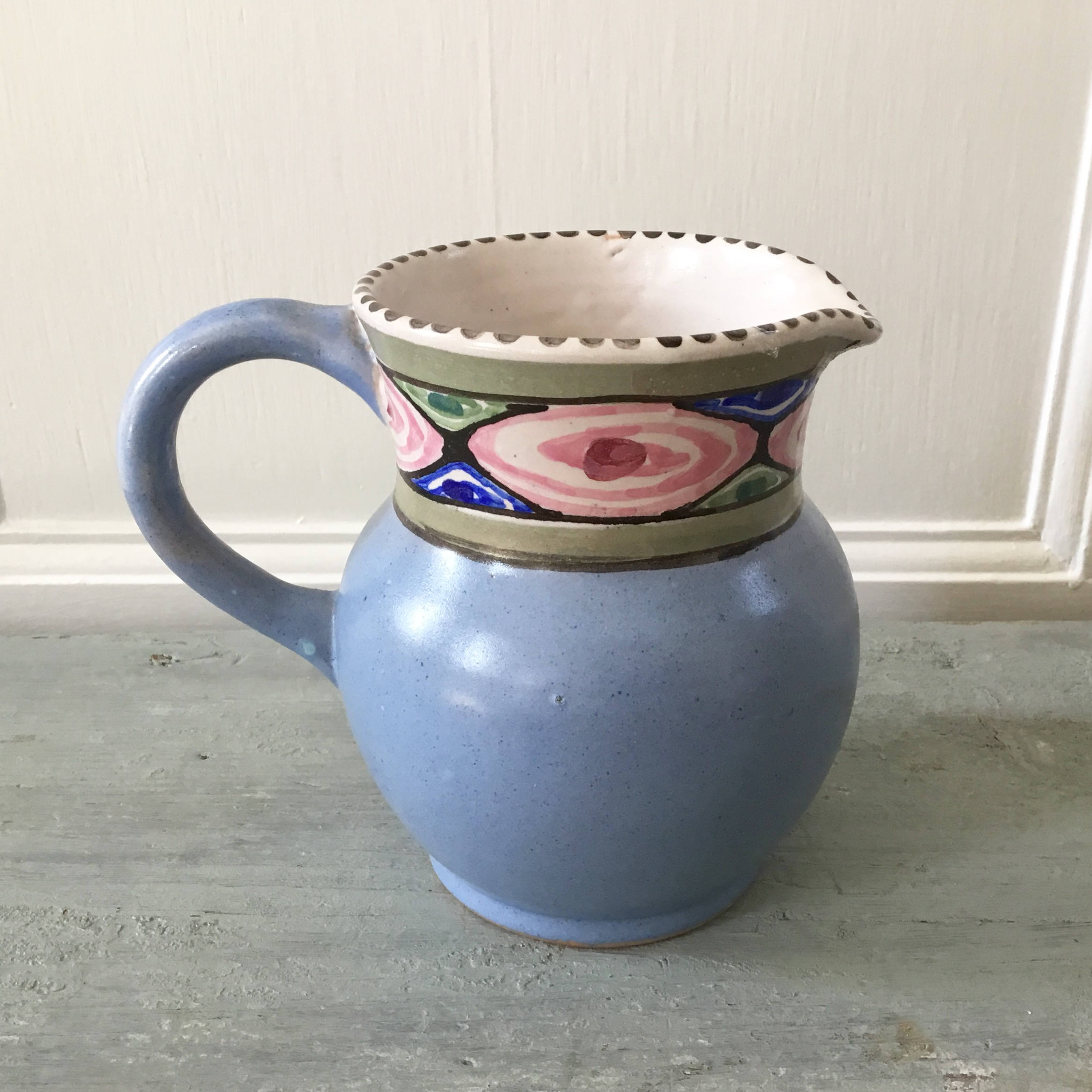 Honiton pottery jug shape 29 pale blue with Jacobean pattern