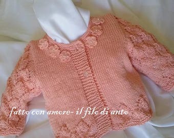 Girl's pink cardigan sweater vest fishing with small flowers