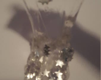 Chrystal clear slime with and a container with optional stars