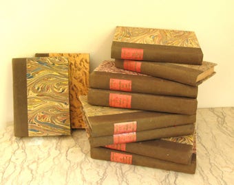 group of vintage 1920's French books in marbled paper bindings