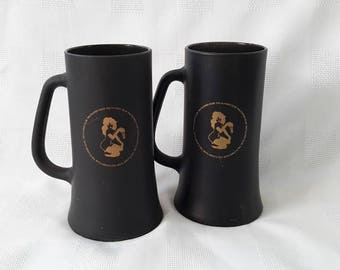 Set of two (2) Playboy Club Black and Gold Beer Mugs