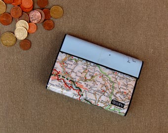 Wallet with geographical Atlas