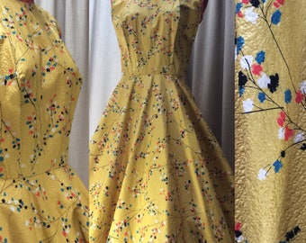 Stunning 1950's printed dress on textured cotton with diamonte trim.