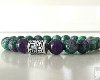 Beaded bracelet epidote and Amethyst Tibetan silver piece