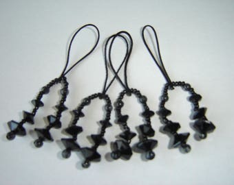 FOUR PEARLS BLACK TASSELS