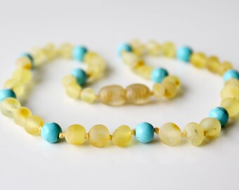 Authentic raw baltic amber baby teething necklace. 32 cm/12.6 in Amber necklace with turquoise beads.