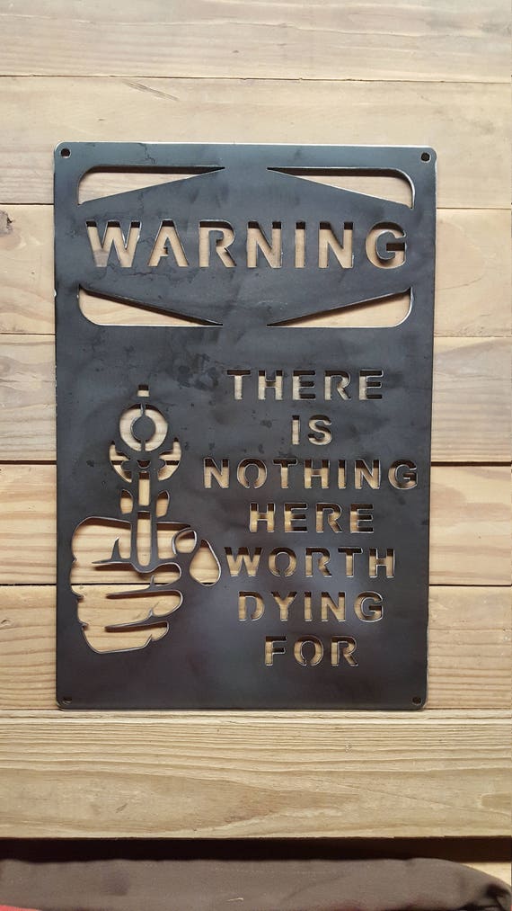 WARNING There is Nothing Here Worth Dying For. MANCAVE SIGN