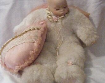 Vintage Doll Dressed in White Faux Fur Snow Suit with Heart Pillow