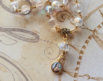 Hand Made St. Therese of Liseux, The Little Flower Chaplet, featuring faceted opalesent glass beads, keepsake.