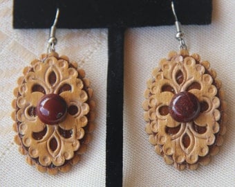 Birch bark earrings .