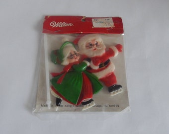 Wilton Santa Claus And Mrs. Claus Cake Topper