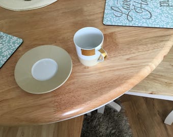 Two bulgari coffee cans and saucers