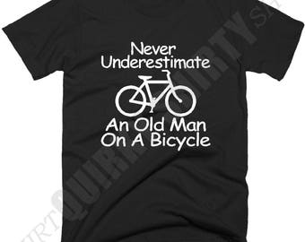 Never Underestimate An Old Man On A Bicycle T-Shirt. Cycling T-Shirt, Gifts For Cyclist, Birthday, New Cotton Shirts, Sizes & Color Choice.