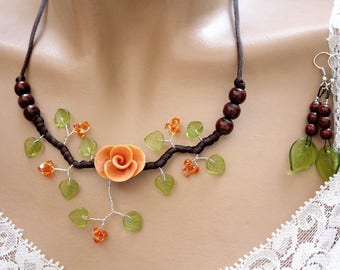 Orange/green/brown floral ornament