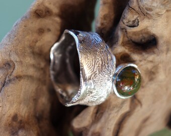 Silver ring with a heliotrope.