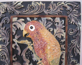 Carved plaster relief of Parrot