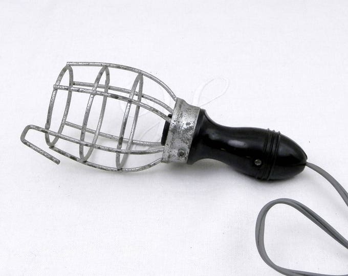 Small Vintage Mid Century Industrial Workshop Caged Hand Lamp, Retro 1950s Portable Inspection Light with Bakelite Handle and Metal Cage