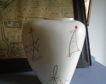 swineside ceramics atomic shaped vase ith atomic pattern