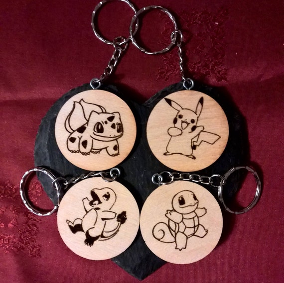 First gen starter Pokémon Keyring - Bulbasaur, Charmander, Pikachu ...