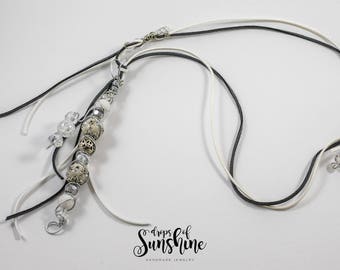 Dancing in black and white necklace
