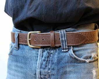 Brown leather belt; leather belt. Brown belt