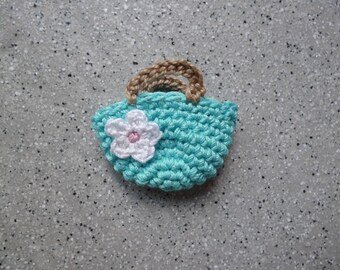 Mini sac au crochet réalisé à la main au crochet en coton turquoise.