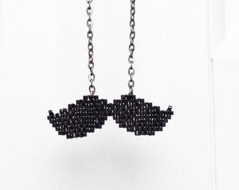 Hand woven black mustache necklace
