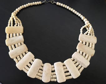 Classy vintage bone necklace.