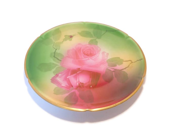 Pink rose plate, signed Imperial Austria Peinture A La Main and Imperial PSL Alma, signed De Fries, green background gold rimmed, c. 1910