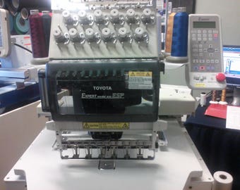 TOYOTA AD850 Commercial Embroidery Machine with 270 cap system