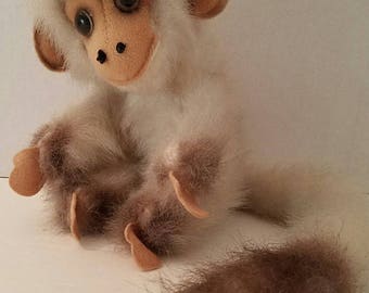 stuffed capuchin monkey