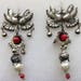 Sale Frida style large kissing birds on top, beautiful daisy with coral bead. Bottom leaves and pearl.