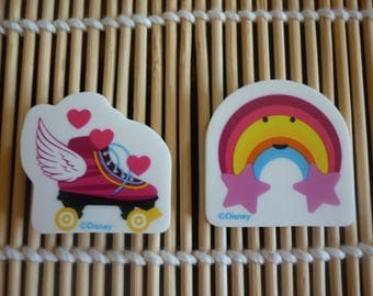Erasers character "SOY LUNA" a skating shoe and a rainbow smiley, sold in packs of 2.