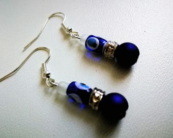 Against evil eye earrings