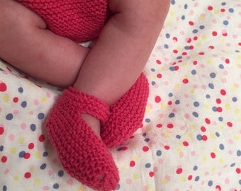 Hand knitted baby booties and diaper cover.