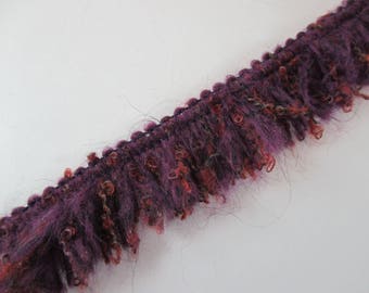Fluffy, woolly, fringe degrade plum and Brown, width 2.5 cm.