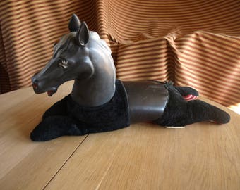 large stuffed black horse