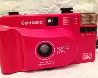 Trendy Concord 818 35mm. film camera. Collectables/Big red/Photography/cameras 35mm camera/
