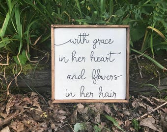 With Grace In Her Heart And Flowers In Her Hair