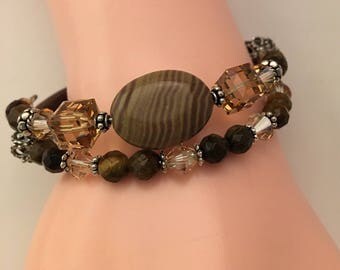 Peanut Jasper and Tigereye gemstone double row memory wire bracelet with Swarovski Crystals and sterling silver.
