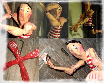 Articulated puppet. Multicolored paper