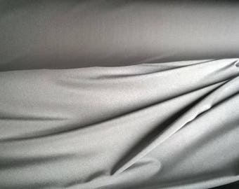 Synthetic fabric grey stretch lycra type