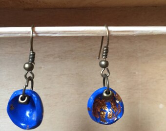 Bronze earrings decorated with gold leaves
