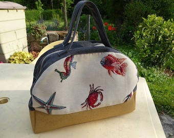 Marine with denim and leather bowling style bag