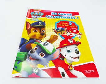 PAT patrol book in front with 2 paw patrol masks activities