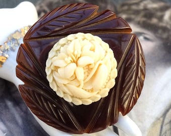 Vintage Bakelite Pin Celluloid Center Carved Brown