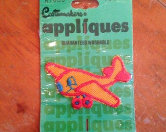 vintage nos deadstock childs smiling airplane appliqué