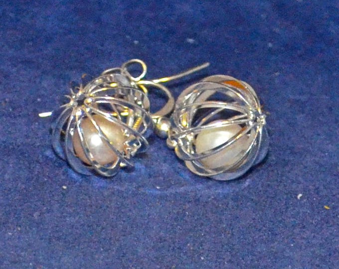 Pearls in a Cage, 7mm Round, not Drilled, Natural, Set in a Silver Plated Cage E1087